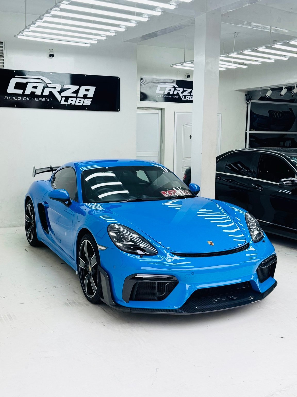 Blue Porsche at Carza Labs